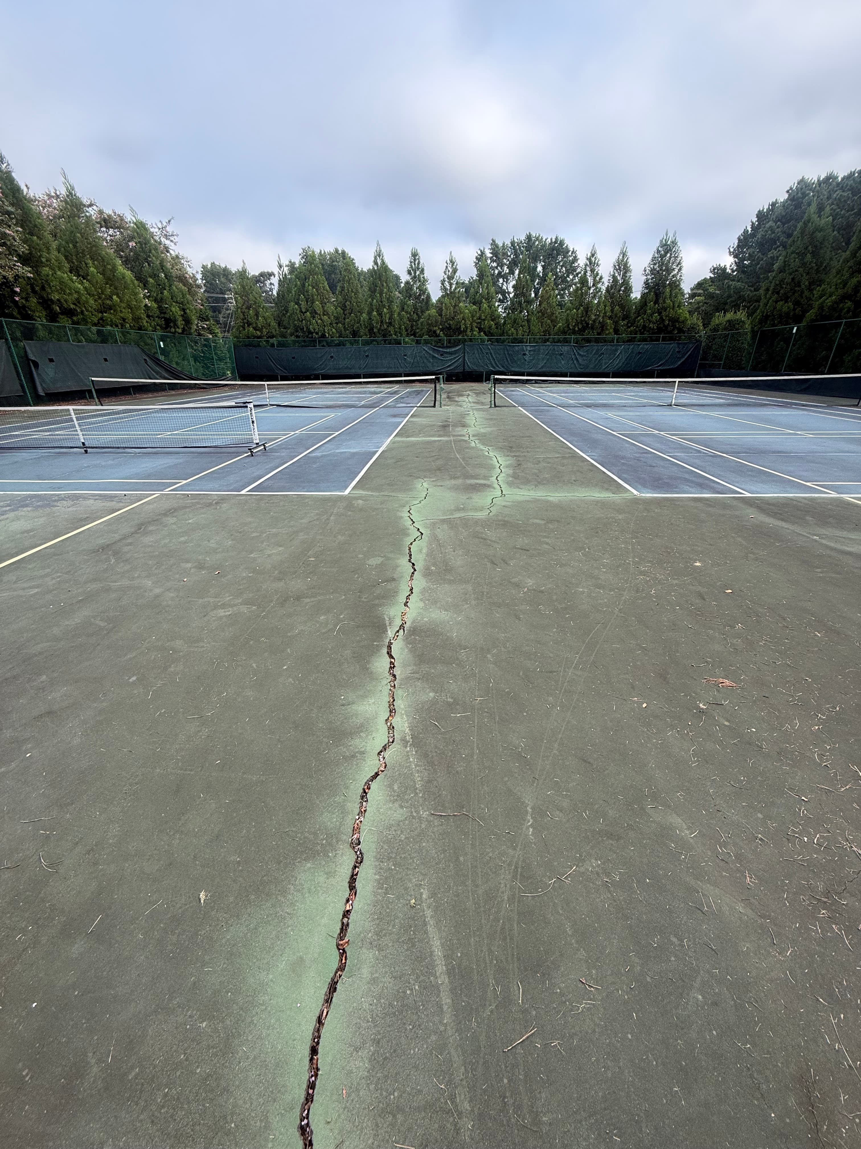 Court crack repair in progress in Marvin, NC